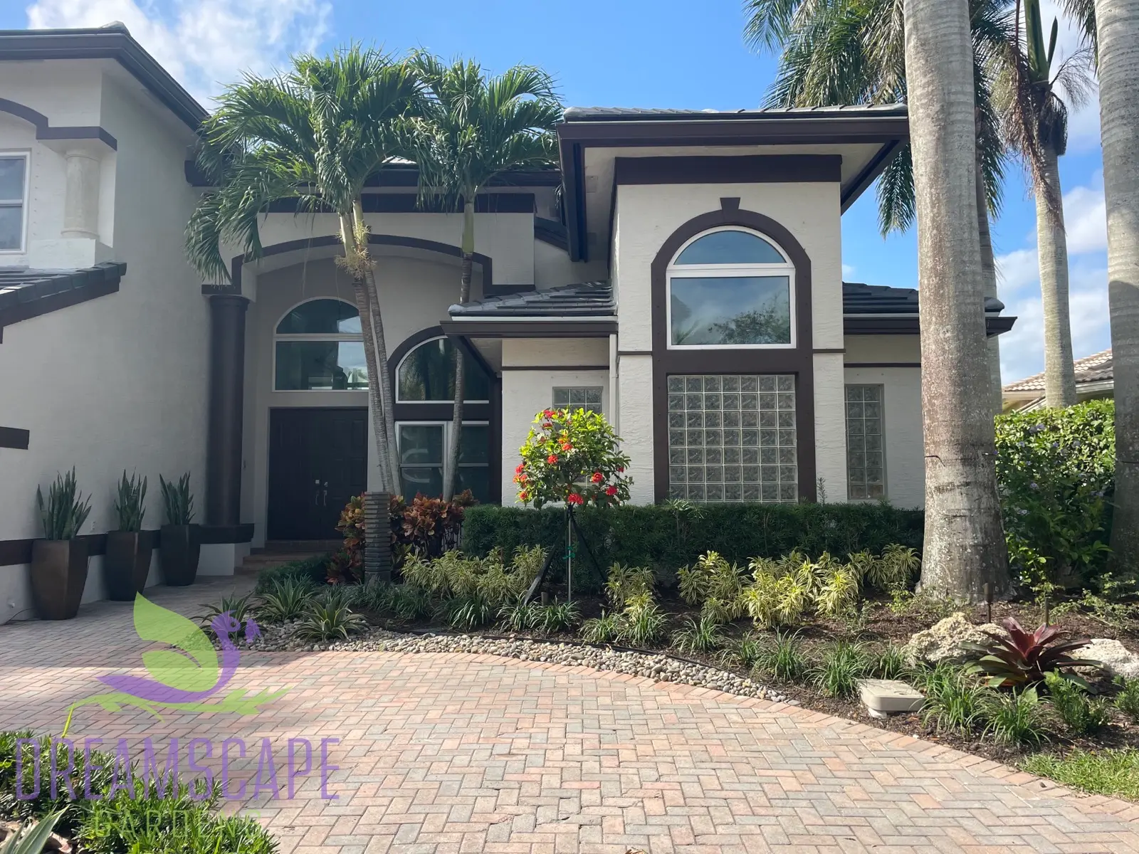 South Florida luxury garden by Dreamscape Gardens — specimen tropical planting