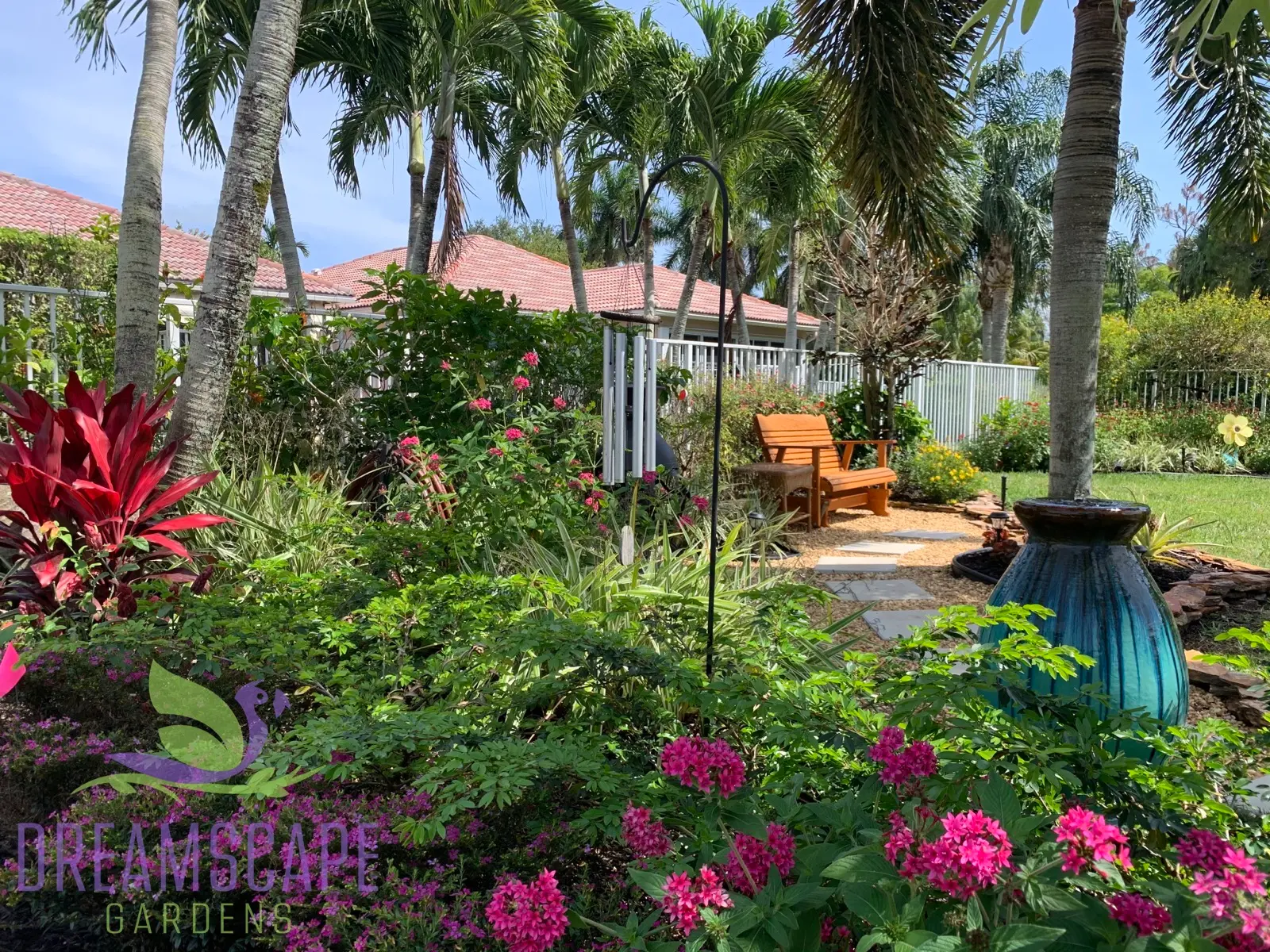 Tropical landscape installation — palm planting and layered garden design