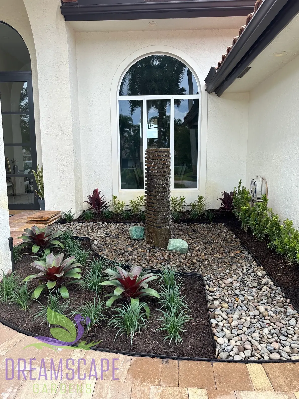 Lush garden design with mature canopy and understory planting by Dreamscape Gardens