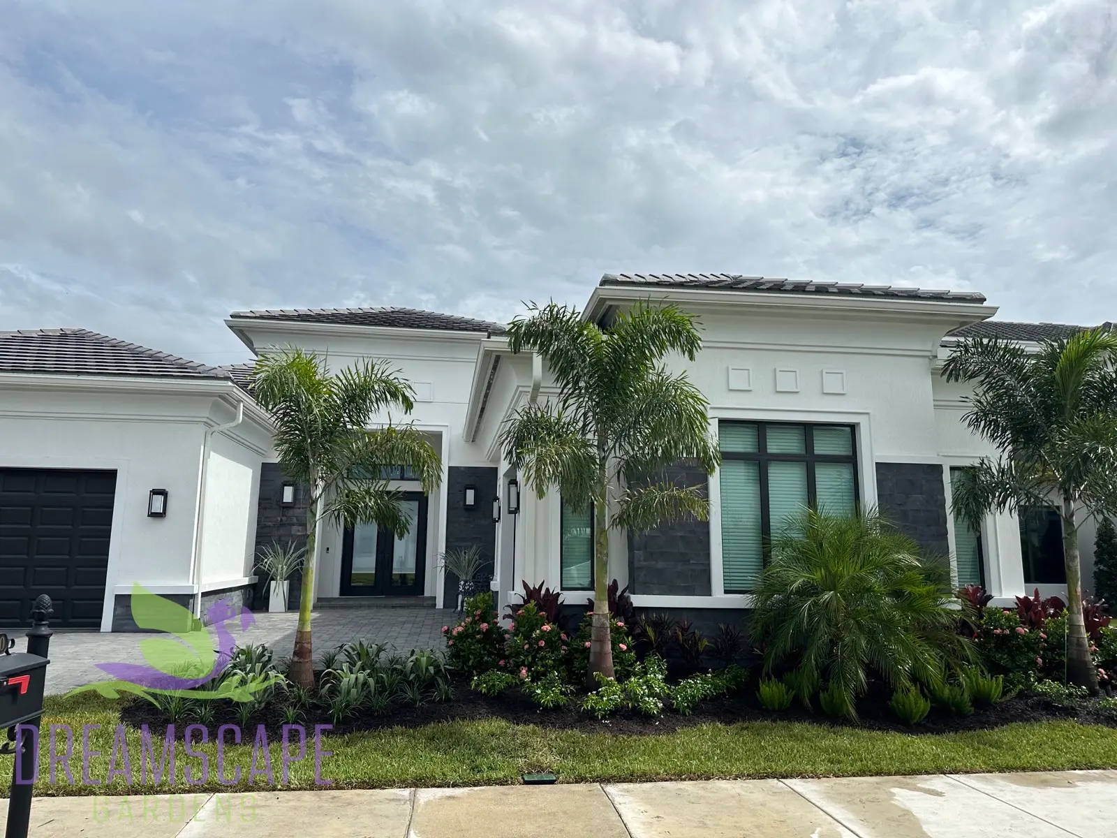 Front yard landscape design — curb appeal with tropical planting and specimen tree