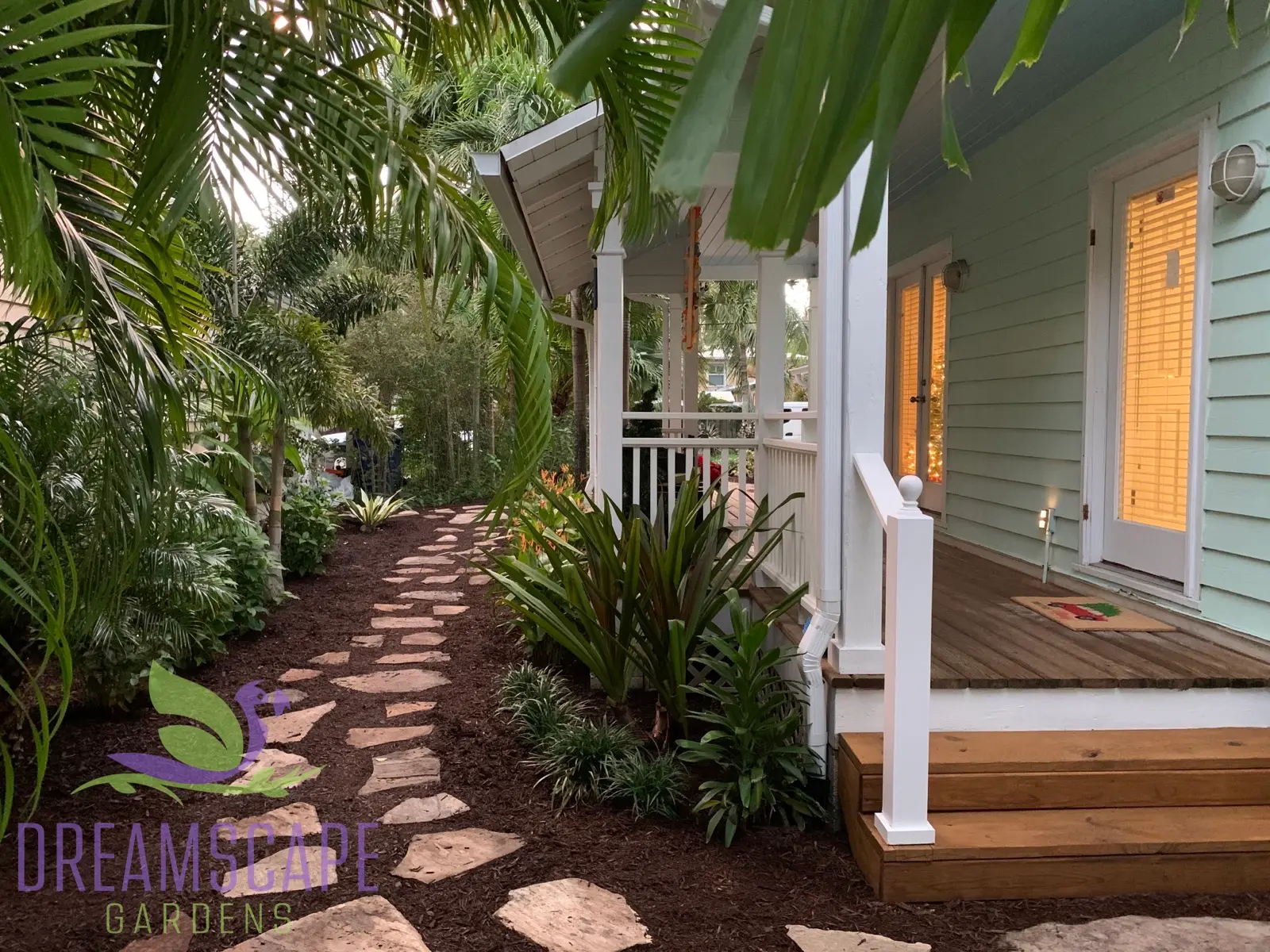 Estate front entrance design — curb appeal with mature tropical planting